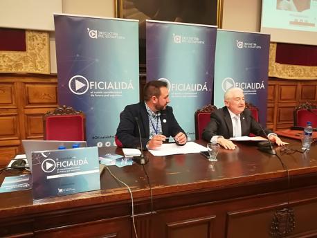 Inaciu Galán y Víctor Manuel Vázquez Portomeñe nel II Seminariu Oficialidá